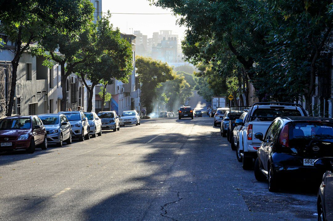 Foggy old street in Montevideo at night with warm streetlamps
